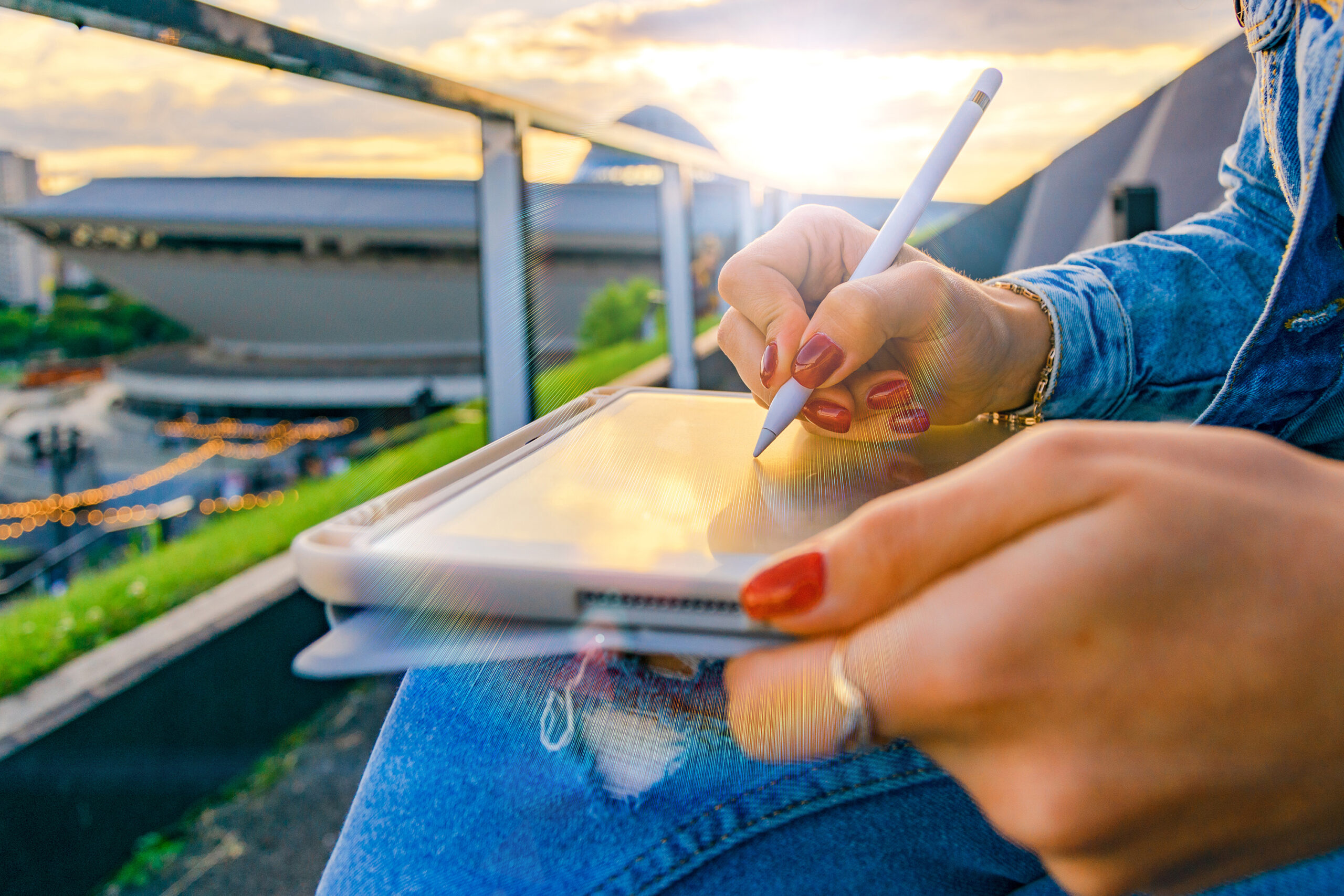 Outdoor online business technology. Student woman work with laptop tablet, computer in nature outside. Person girl sitting in summer park with people. Happy hipster young distance learning concept